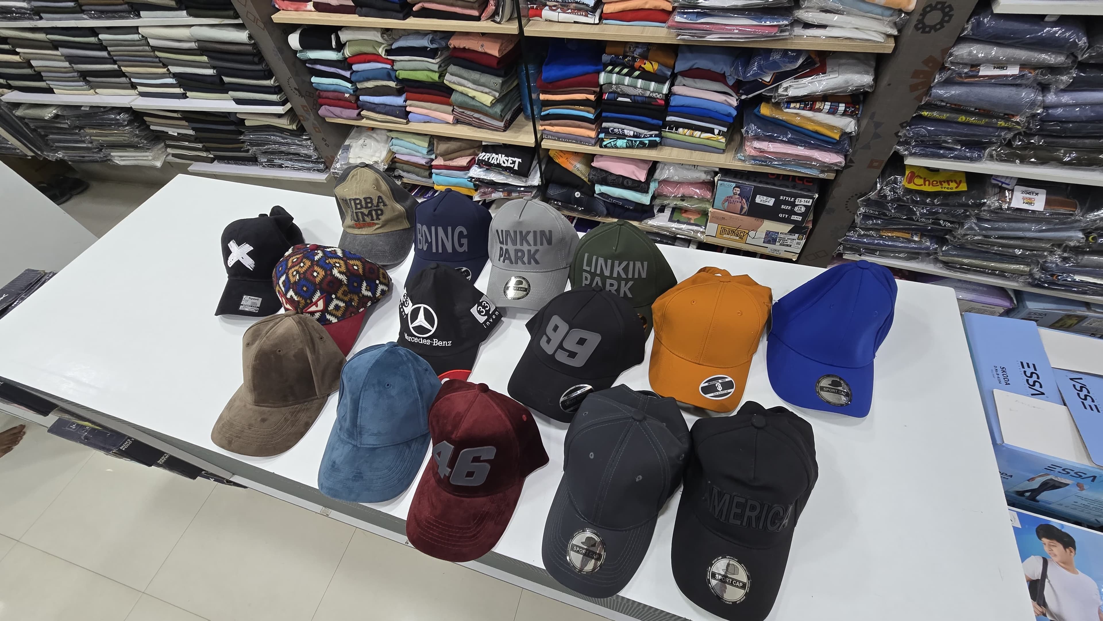 Men's fashion accessories including belts, sunglasses, and caps